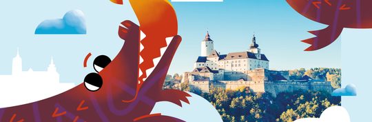 Drachen mit Burg Forchtenstein im Hintergrund